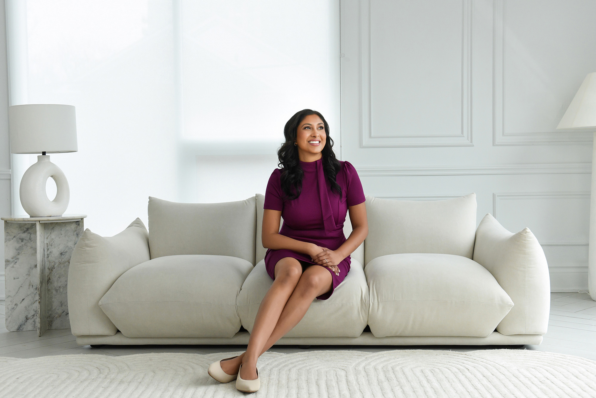 Professional woman in a modern office setting, exemplifying branding photography for entrepreneurs.