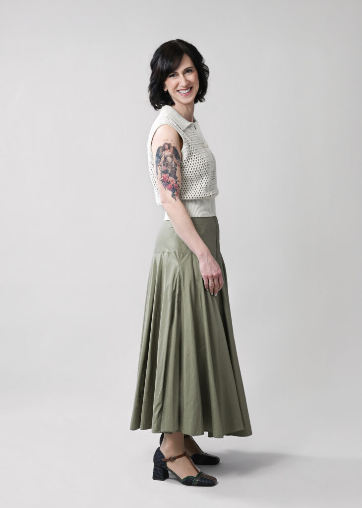 Timeless portrait of confident woman over 40 wearing elegant textured clothing